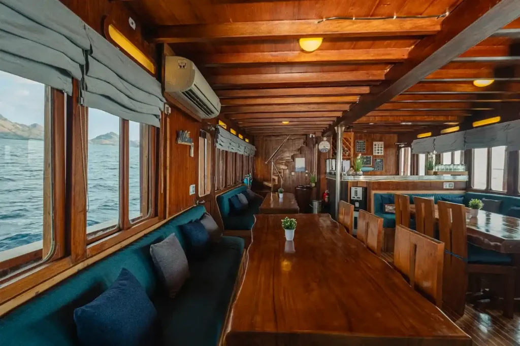 Indoor Dining Area on Cajoma V Phinisi Boat Charter | Liveaboard | Komodo Tour | Komodo Luxury